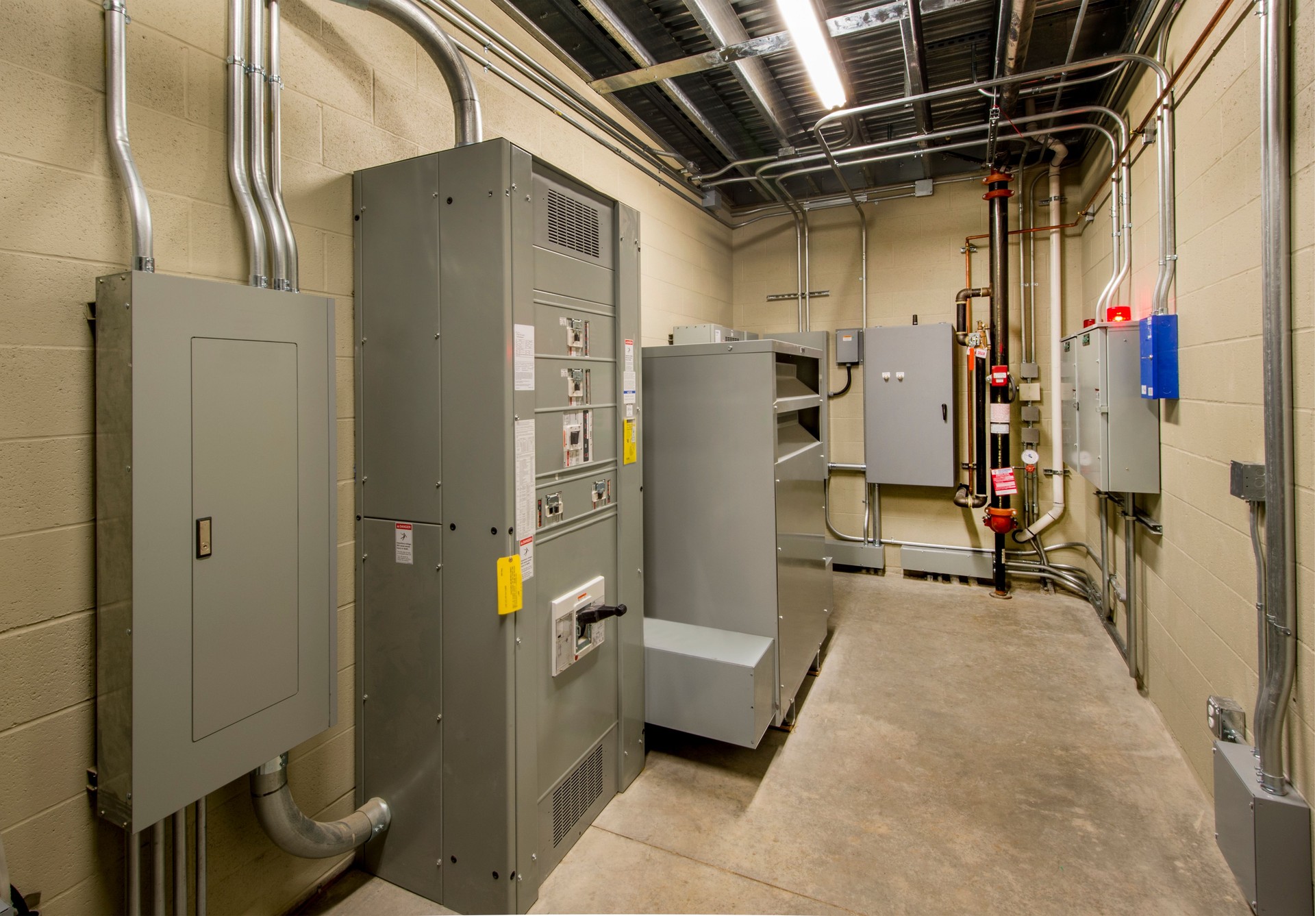 Electrical Room with Circuit Breakers and Transformers